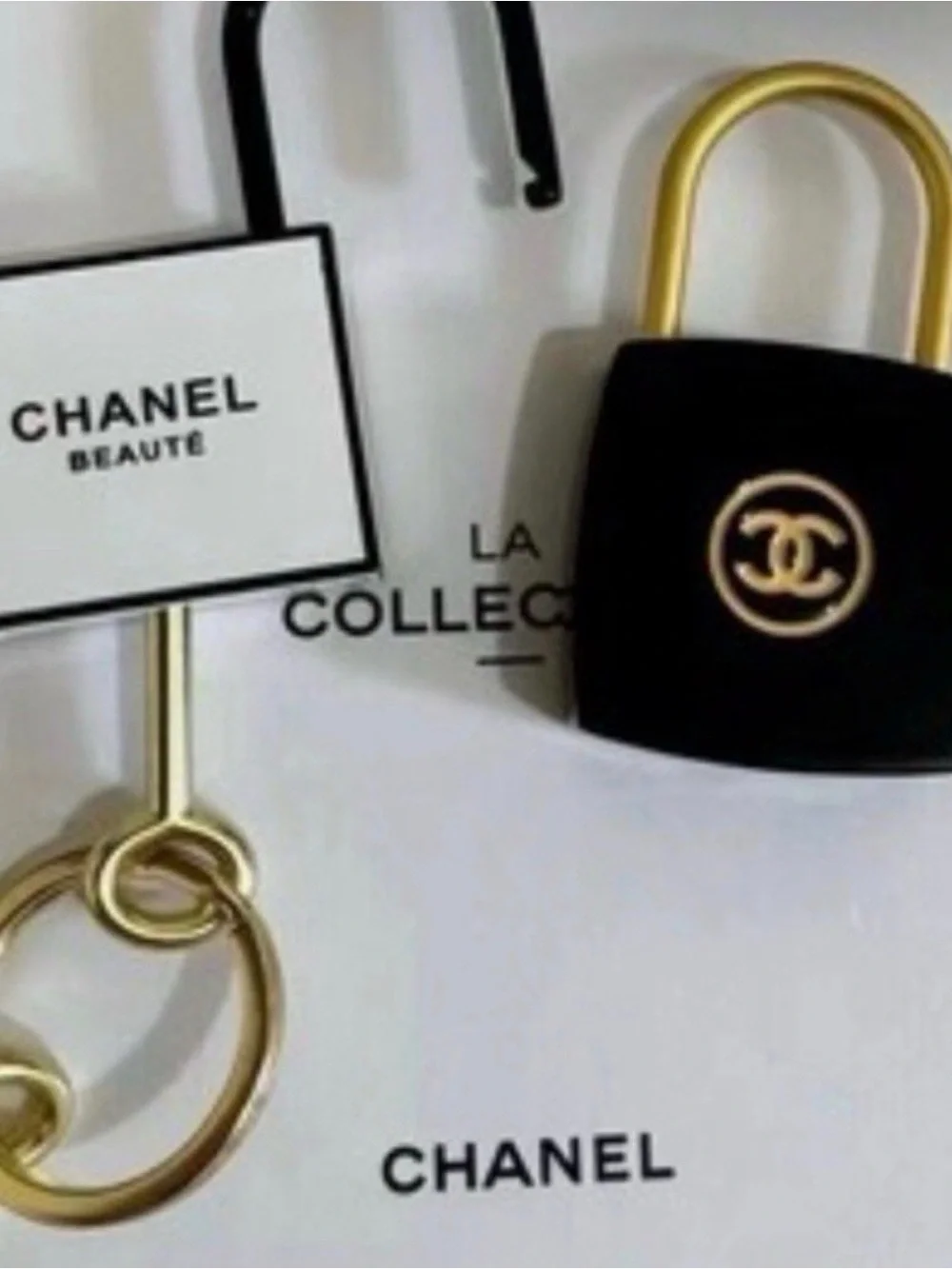 Chanel White and Black Mini Lock Keychain - Picture 3 of 4